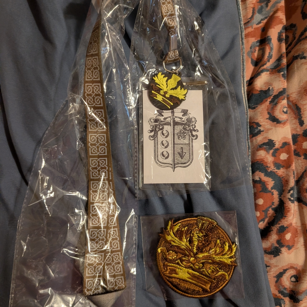 Gray Patterned Tie with Embroidered Patch